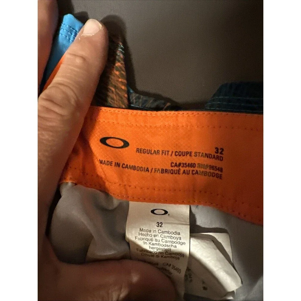 Oakley 32 Blue Board Shorts Zip Pocket Orange Regular Fit Swim Skull Y2K Print